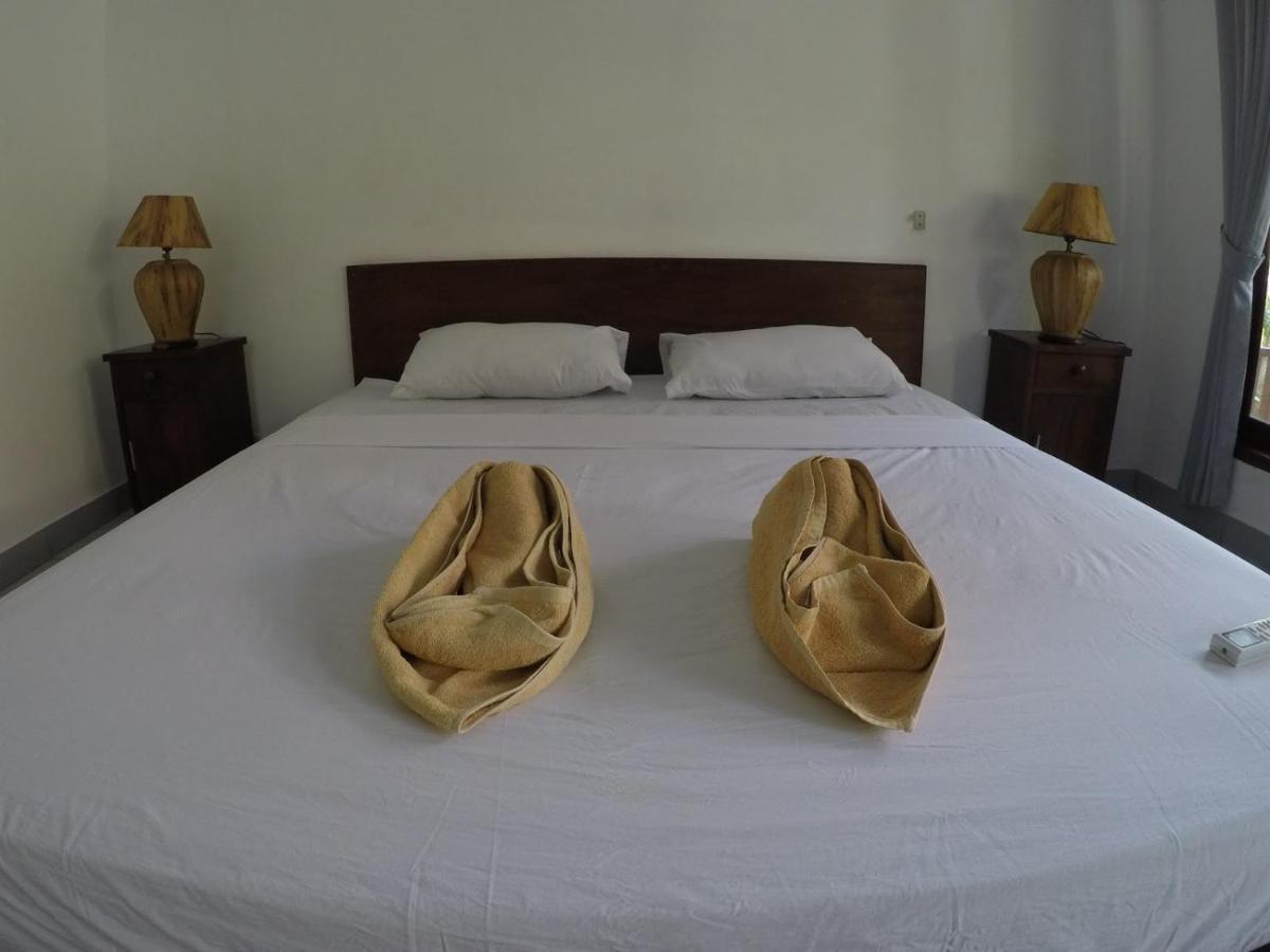 Gili Smile Bungalow กีลีตราวางัน ภายนอก รูปภาพ